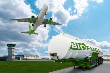 An aeroplane and a biofuel tank trailer in an airport environment. 